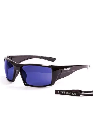 Lunettes de soleil flottantes OCEAN SUNGLASSES Aruba Shiny Black / Blue Commander Maintenant